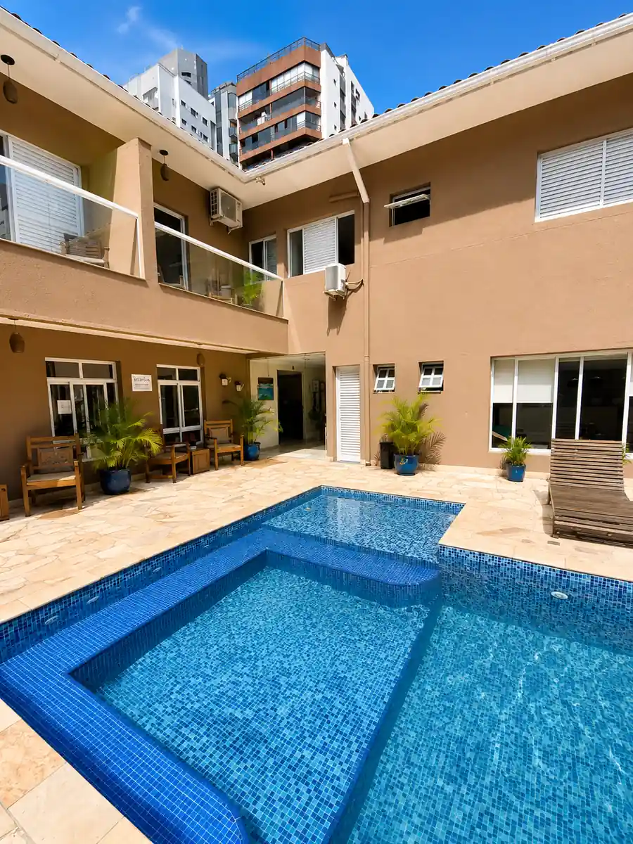 Outdoor pool area at Hotel Casarão Pitangueiras.